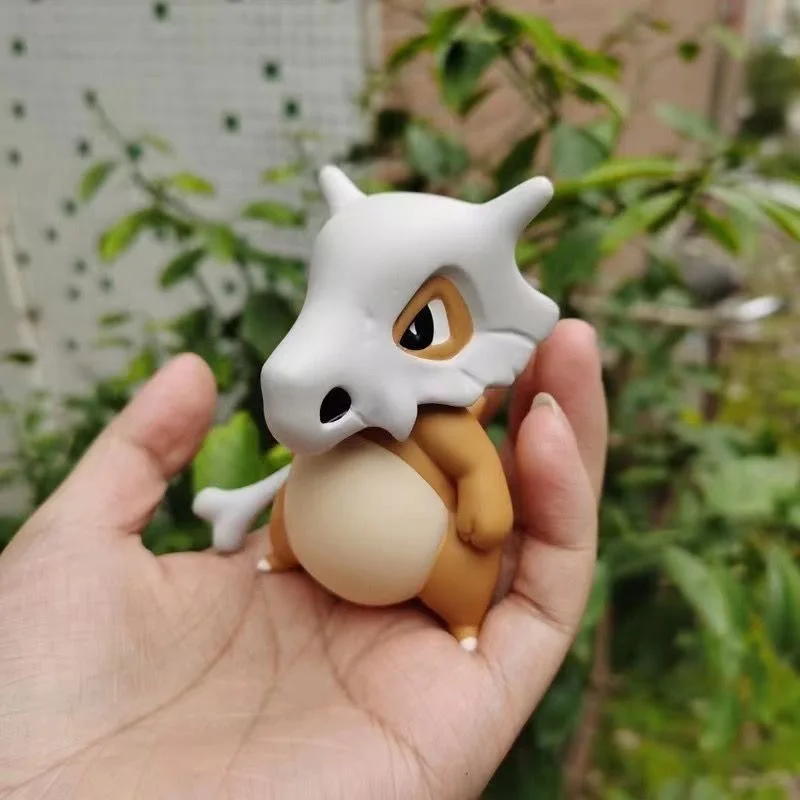 Pokemon Anime Figure Pocket Monsters Cubone 8 cm Cute Action Figure Ornamenti montati su auto Decorazione modello Giocattoli per bambini Regali