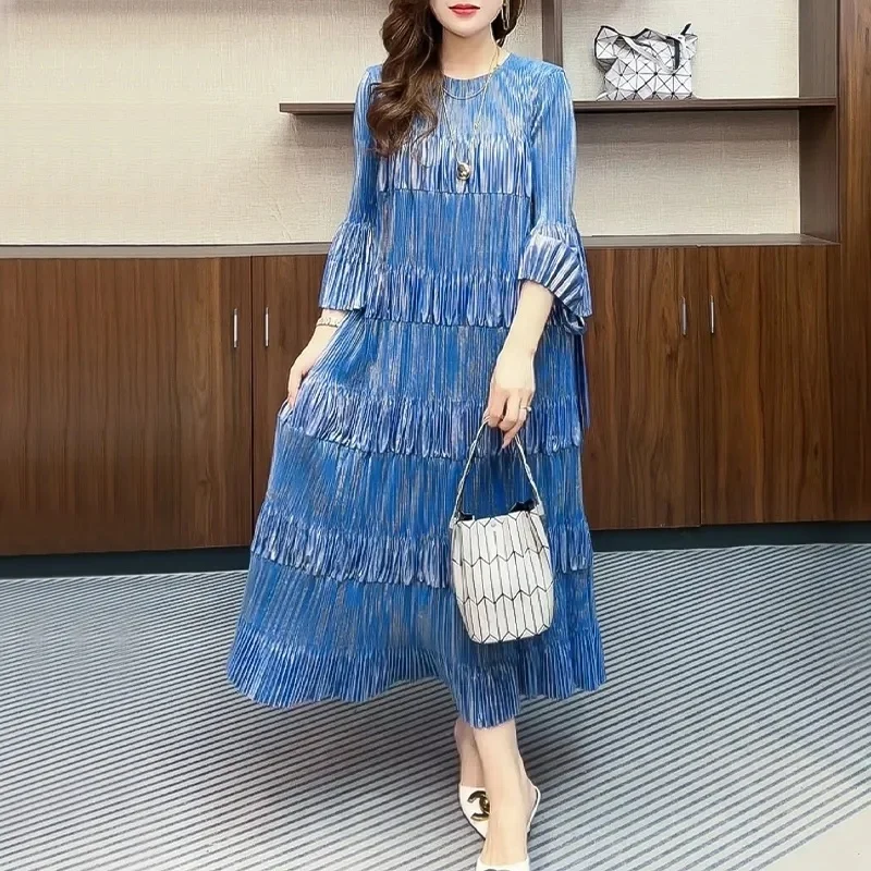 เดรสพลีทผู้หญิงแบบใหม่: เดรสทรงเสื้อยืดหลวมๆ ดีไซน์หรูหรา พร้อมพู่ห้อยและชายกระโปรงแบบหลายชั้น ไซส์ใหญ่ ช่วยพรางหุ่น ให้ลุคผู้ใหญ่สง่างาม (w1825)