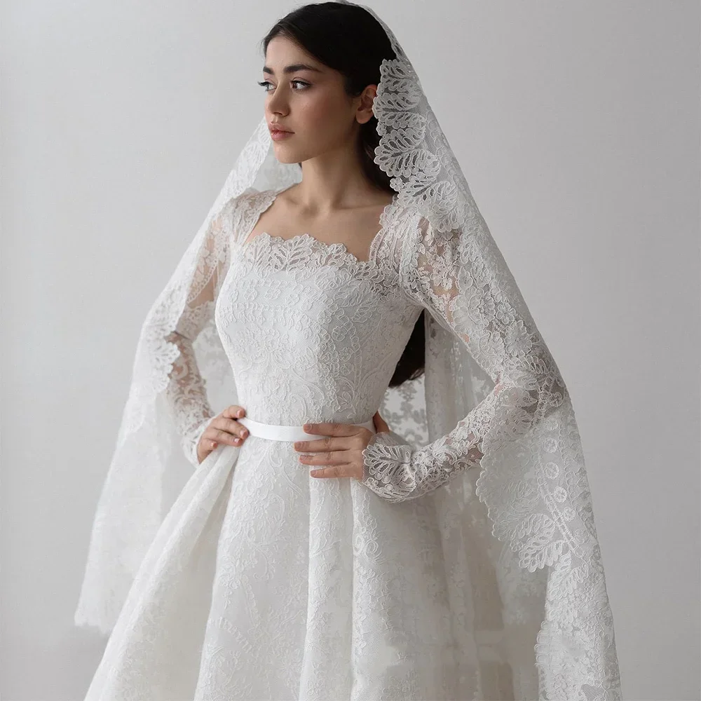 فساتين زفاف دانتيل رائعة مخصصة أنيقة برقبة مربعة وأكمام طويلة سويب تراين فستان العروس العربية فيستدو دي نويفا