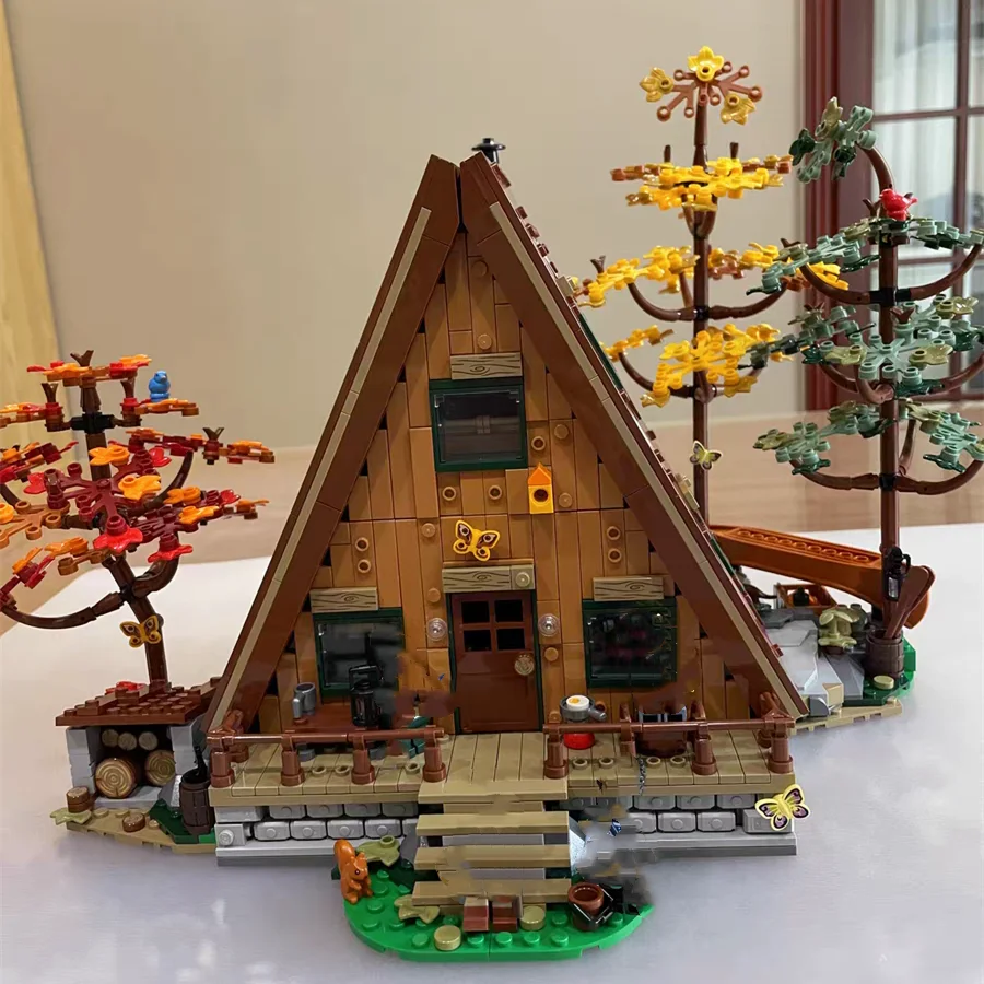 

NEW IN STOCK Camping Forest A Frame Cabin Model Creativity House Idea 2082pcs Compatible With 21338 Building Blocks Brick Toys