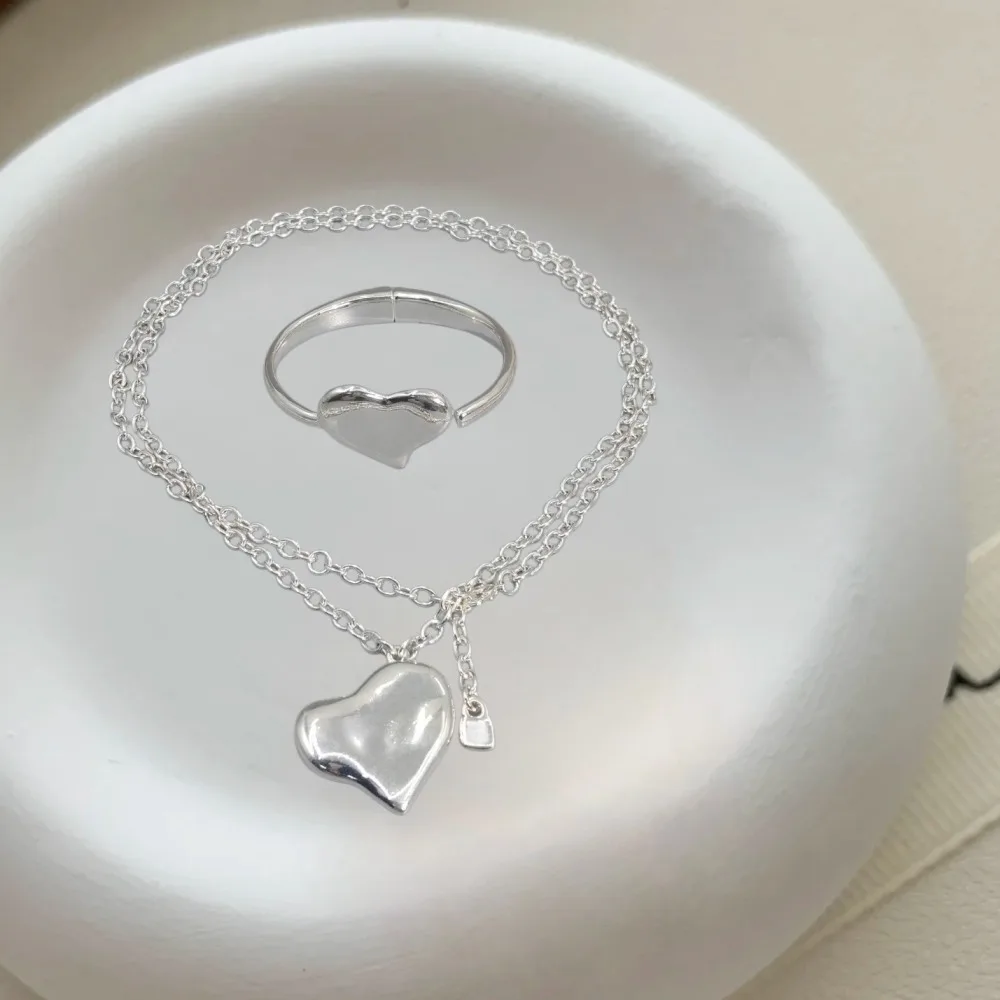 

2026 Spain Gentle and Elegant Gold and Silver Heart shaped Earrings Long Necklace Jewelry Two Piece Romantic Gift Set