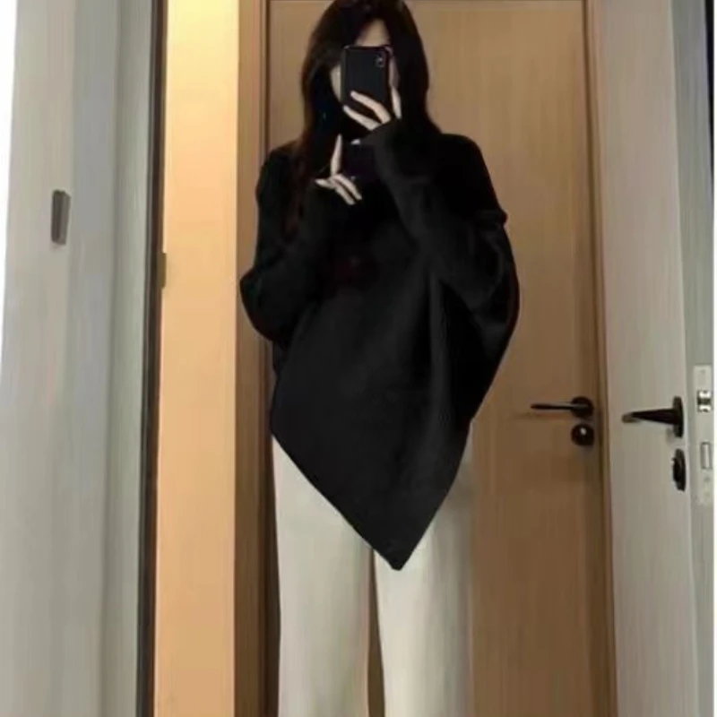 เสื้อสเวตเตอร์ถักไหมพรมทรงไม่สมมาตร แขนยาวทรงปีกค้างคาว สำหรับผู้หญิง สไตล์สตรีทแวร์ลำลอง เหมาะสำหรับฤดูใบไม้ร่วงและฤดูหนาว คอเต่า