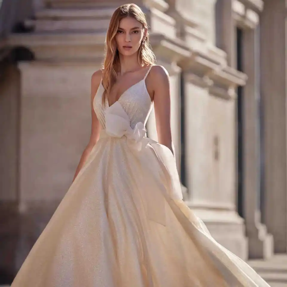

Gorgeous Ball Gown Wedding Dresses Beading Lace Spaghetti Strap Bow Bridal Gown Sweep Train Vestido De Noiva Customized