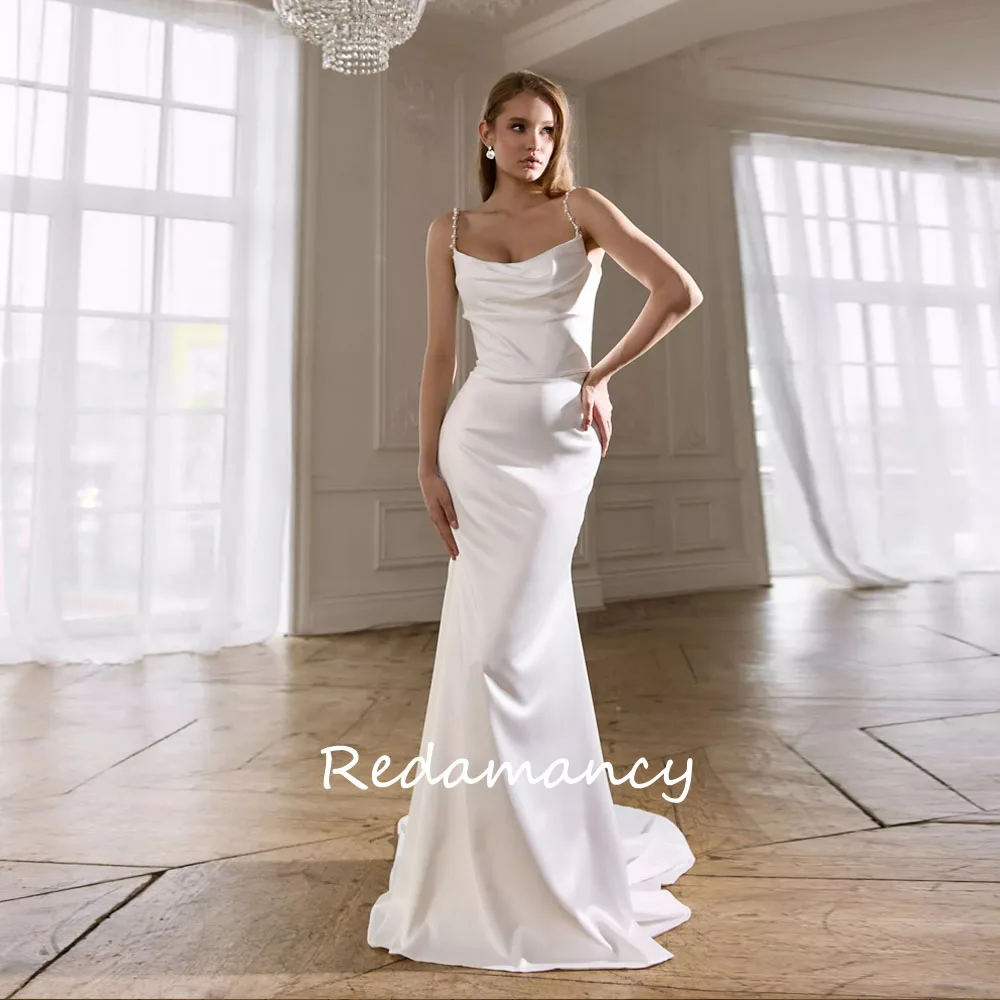 

Redamancy Customized Ivory Scoop Neck Satin Wedding Dress Lace Up Back Prom Dress Beading Spaghetti Strap Mermaid Party Dress