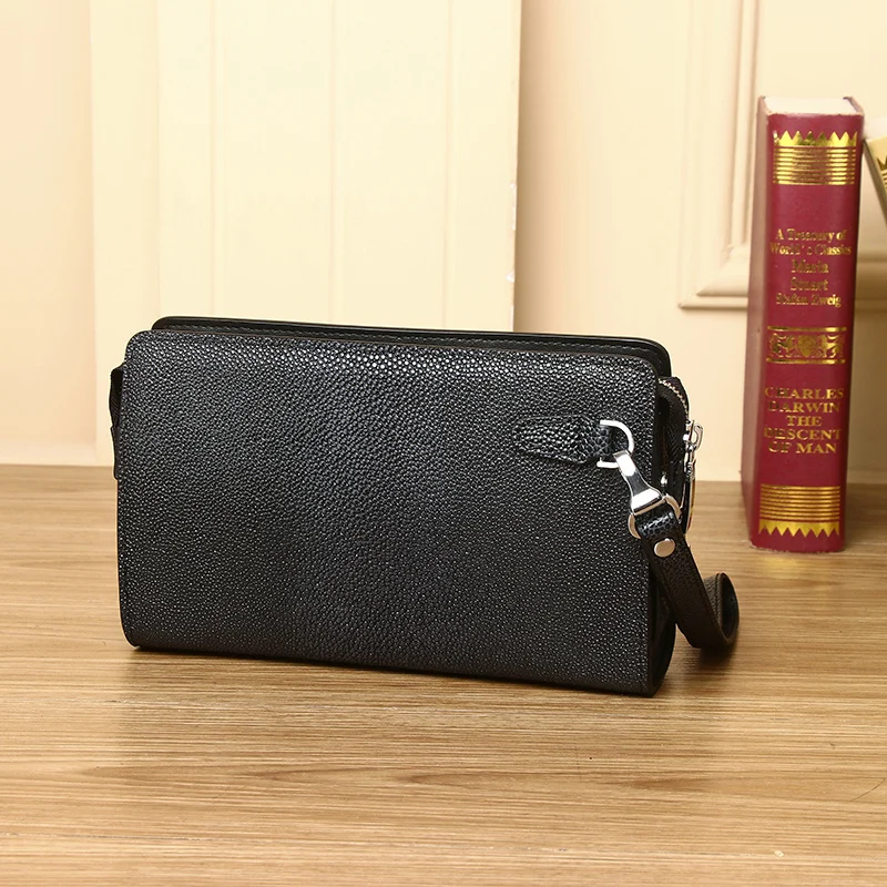 New Leather man bag handbags high-capacity Password Lock Men's handbags Pearl fish wrist bag fashion folder bag