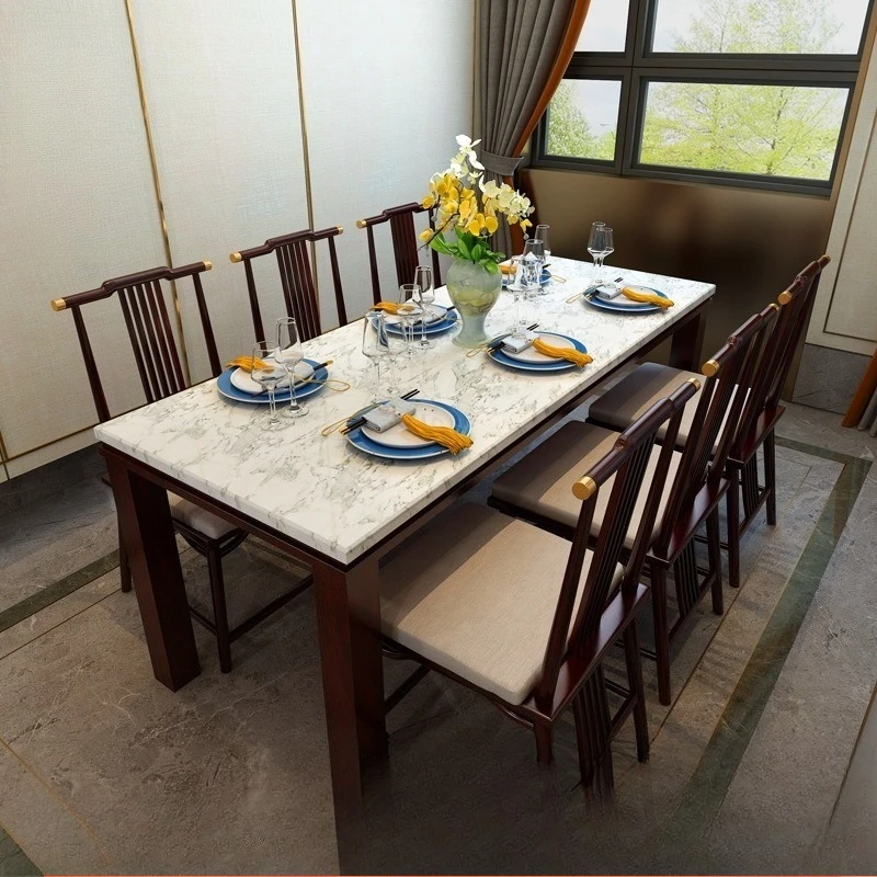 

dining table and chair combination, one table and six chairs, modern simple solid wood rectangular dining table, small household