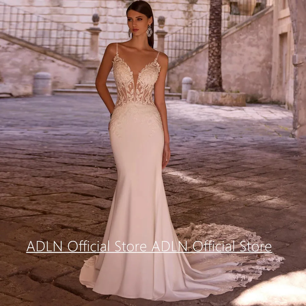 Abiti da sposa sexy a sirena per la sposa Cinghie per spaghetti personalizzate Scollo a V Abito da sposa con strascico di corte con applicazioni trasparenti sul corpo