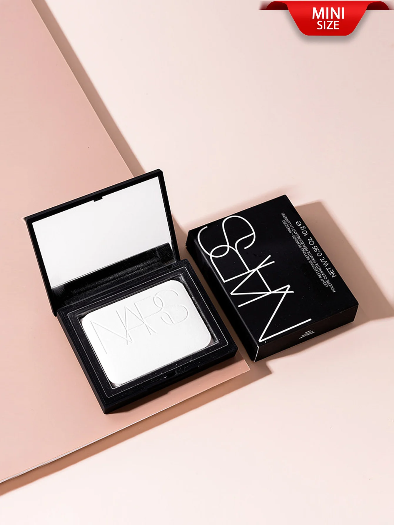 NARS[Mini]LIGHT REFLECTING SETTING POWDER-PRESSED 1.8g This Iconic Formula Locks Makeup In Place All Day With A Luminous Finish.