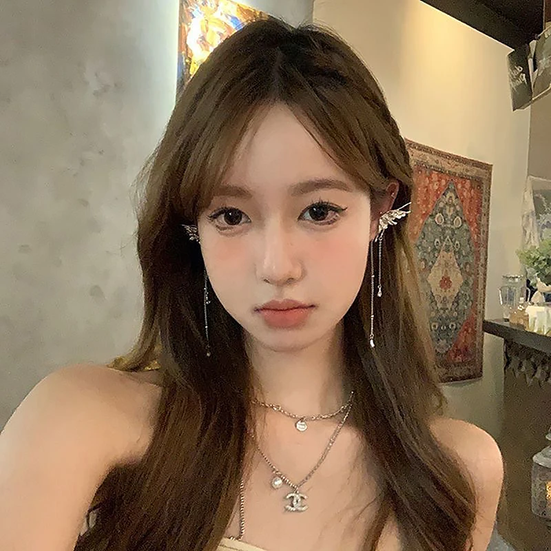 Boucles d'oreilles ailes d'ange en métal liquide, 1 paire, pompon papillon, manchette d'oreille, Non Piercing, Design Punk tendance, longue pince d'oreille pour femme, bijoux