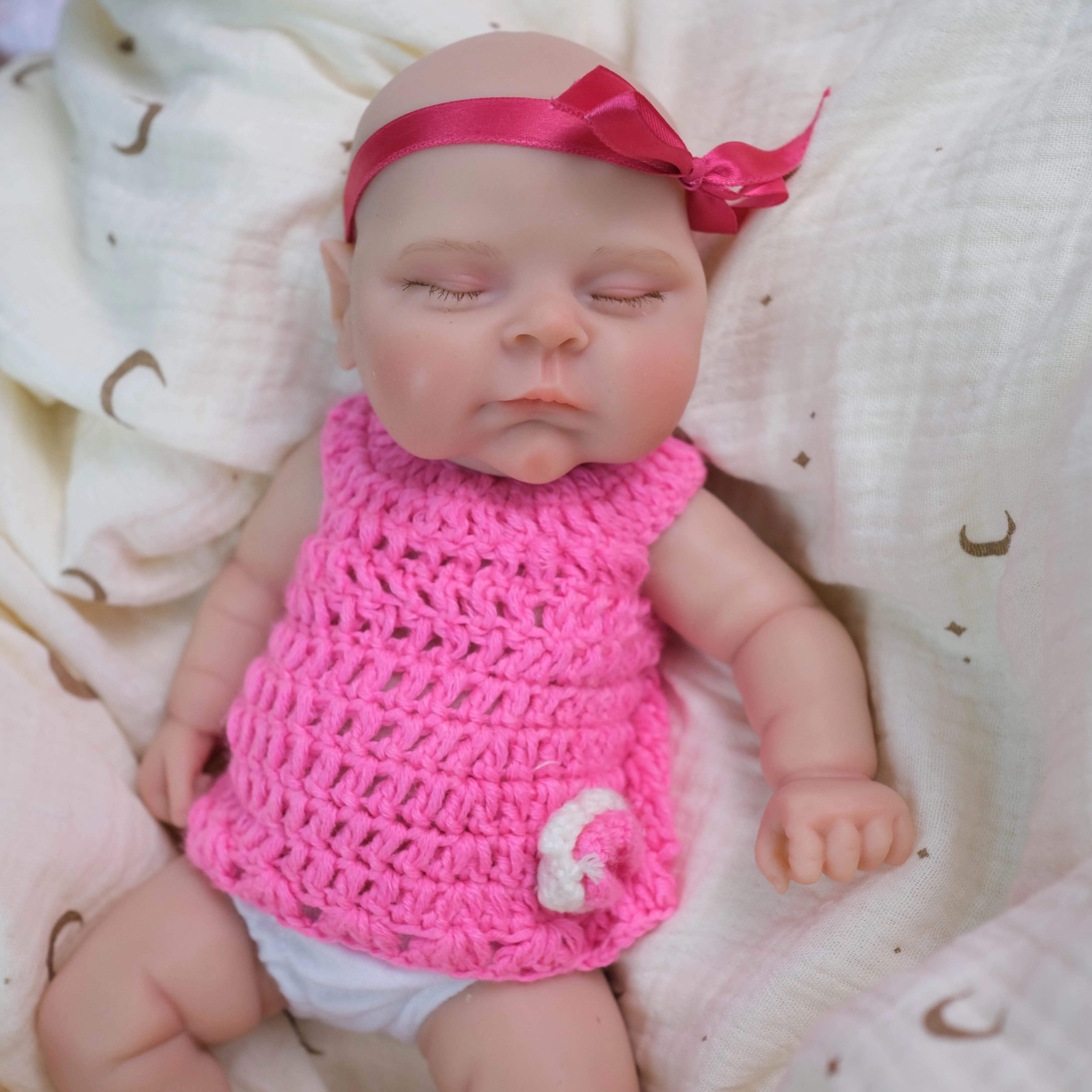 

NPK Peaches 12inch Girl Collector Doll with Pink Cloth Super Soft Elastic Silicone Mouth That Can Open