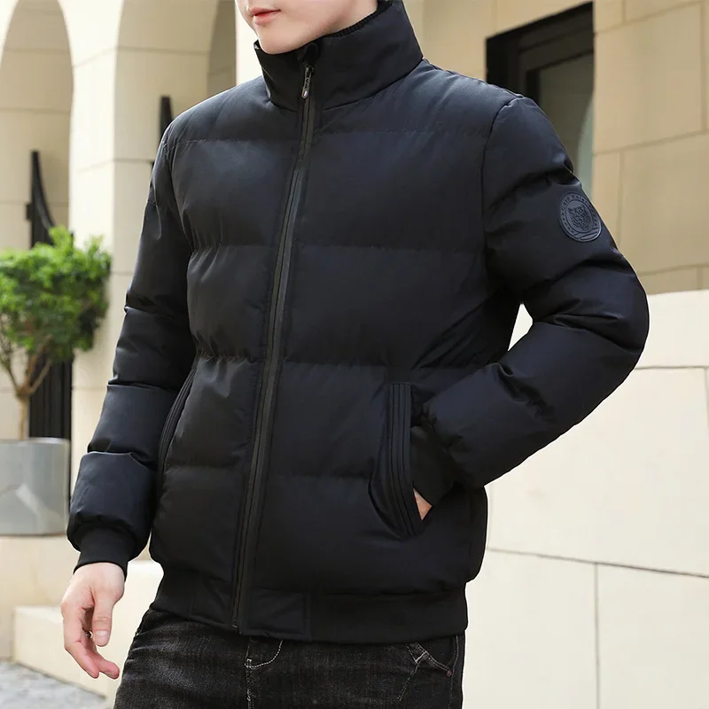 European and American Men Autumn and Winter Fashion Stand-collar Solid Color Zippered Puffer Cotton-padded Jacket. M-5XL