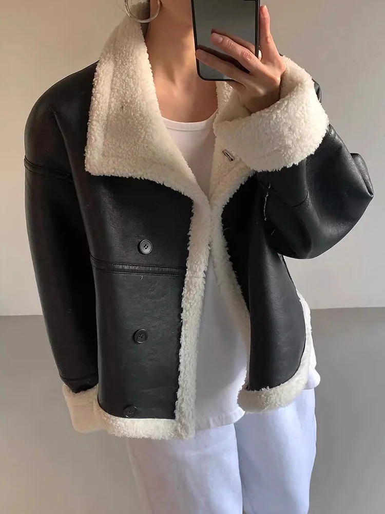 シックな冬ヴィンテージスタイリッシュなラペルルーズスプライシングPUレザーファー長袖レディースジャケットファッショナブルなオールマッチアウター