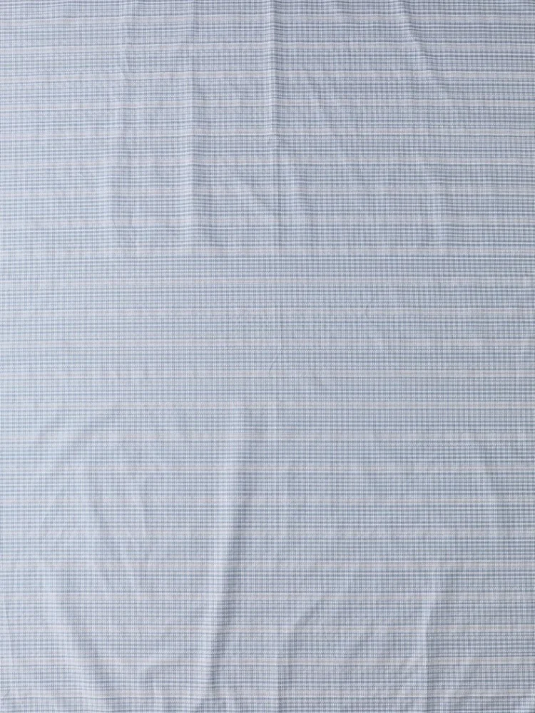 

Sea salt color cotton-polyester fabric with blue and white checkered striped pattern. Shirt. Skirt. Handmade garment surface.