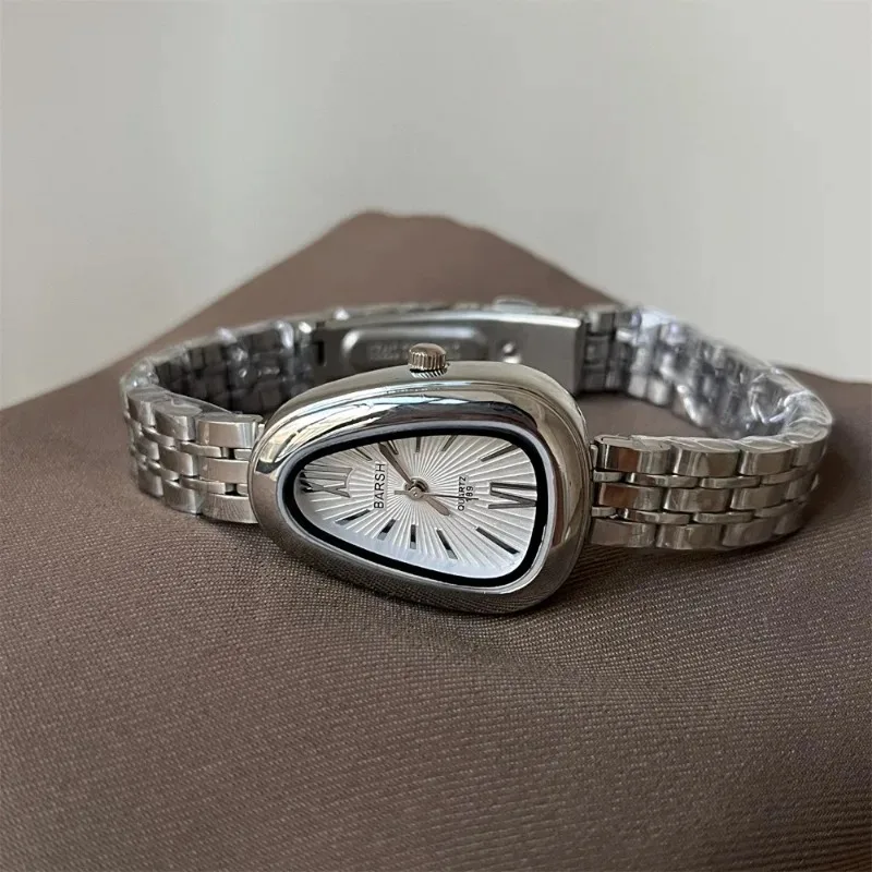 

Брендовые женские часы со змеиным циферблатом, роскошные женские кварцевые часы, наручные часы в форме капли с римскими цифрами и стальным ремешком, подарочные часы