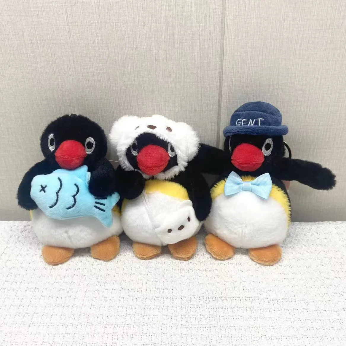 new Cute lovely Creative cross dressing Hug Fish Penguin Plush Doll Keychain Backpack Pendant Store Amusement Park Doll