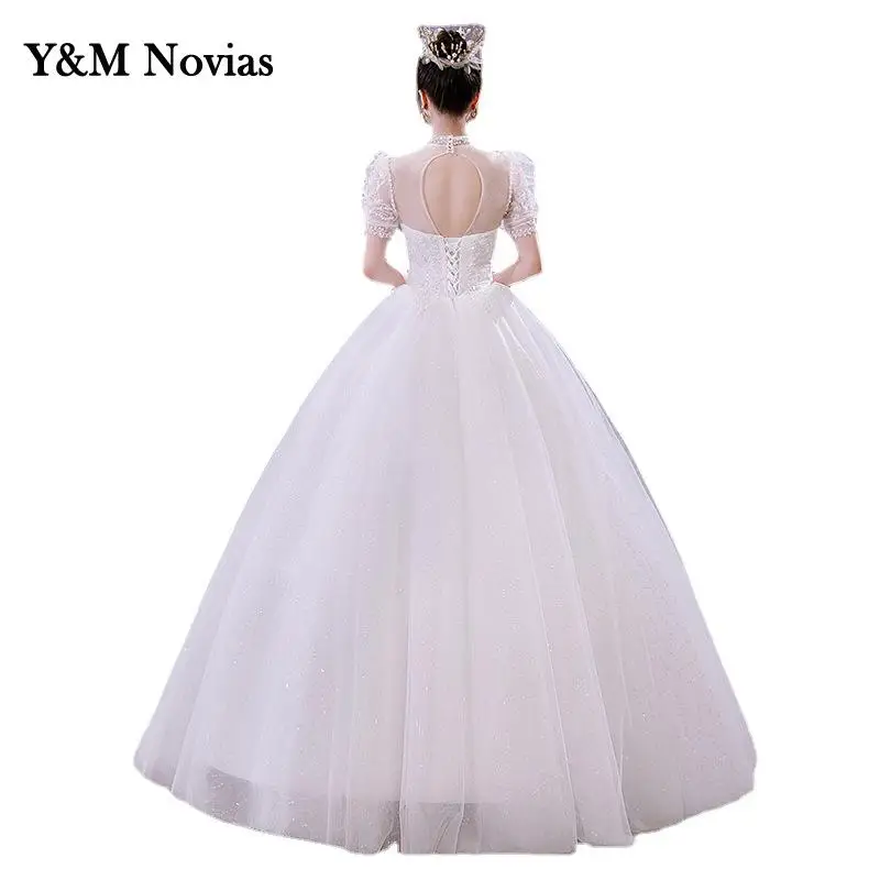 Y & M Novias Nieuwe Licht Trouwjurk Bladerdeeg Mouw Hoge Hals Luxe Kant Applicaties Bead Lovertjes Droom Bruid Gown plus Size Illusion