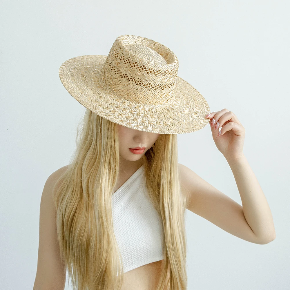 

Spring and summer fashion leisure wide eaves retro hand-woven hollow pattern sisal ring flat straw hat sun protection hat