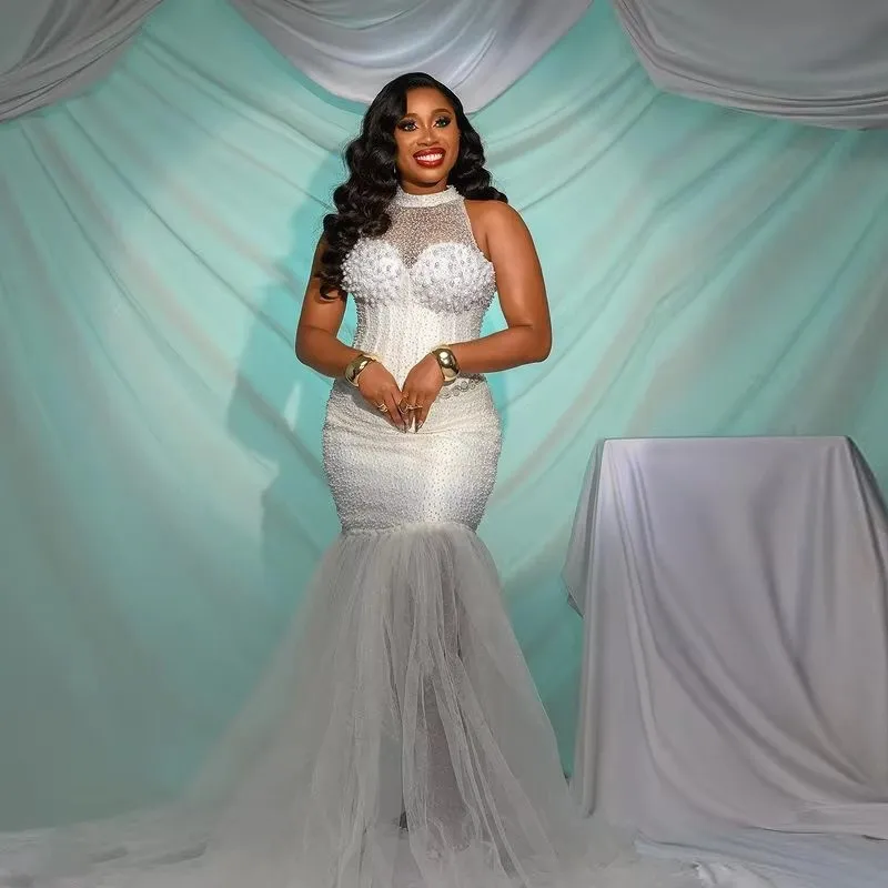 

Вечерние платья-русалка 2026 с кружевом, бретелью через шею, жемчугом и бисером, без рукавов, для африканских женщин, для торжественных мероприятий и вечеринок
