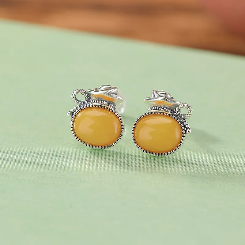 

Amber S925 Sterling Copper Coin Money Bag Tooth Pattern Oval Style Silver Earrings