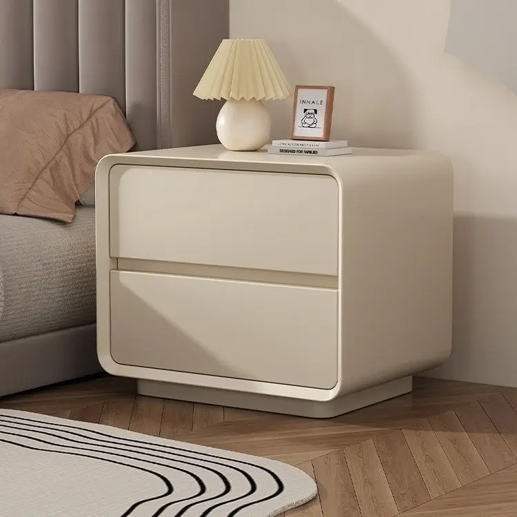 

Cream wind bedside table simple modern bedroom bedside small storage cabinet light luxury high-end solid wood bedside few