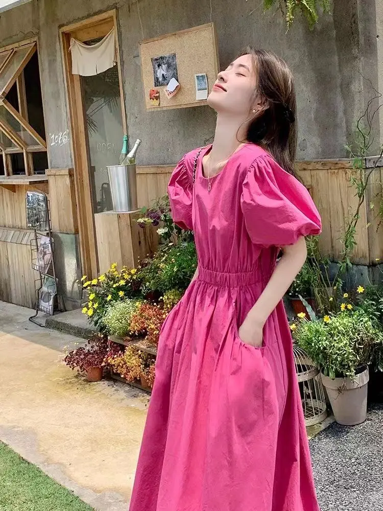 Vestito da vacanza dimagrante temperamento 2024 nuova versione coreana vestito da ragazza a maniche corte con maniche a bolle Casual alla moda