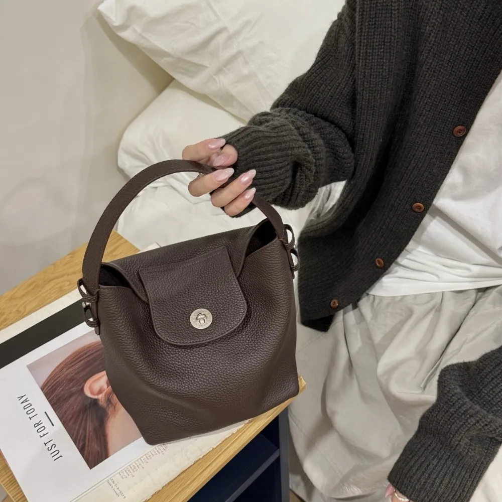 Light Luxury Niche First-layer Cowhide Bucket Bag Women's High-end Portable Dish 2026 New Shoulder Messenger Texture Fashion