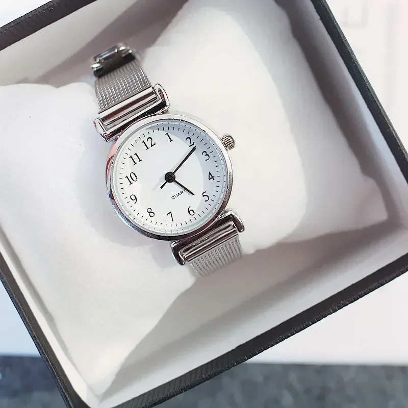 Reloj de cuarzo a la moda para mujer, relojes femeninos de lujo, reloj de pulsera, banda de acero inoxidable blanco y negro, relojes clásicos para