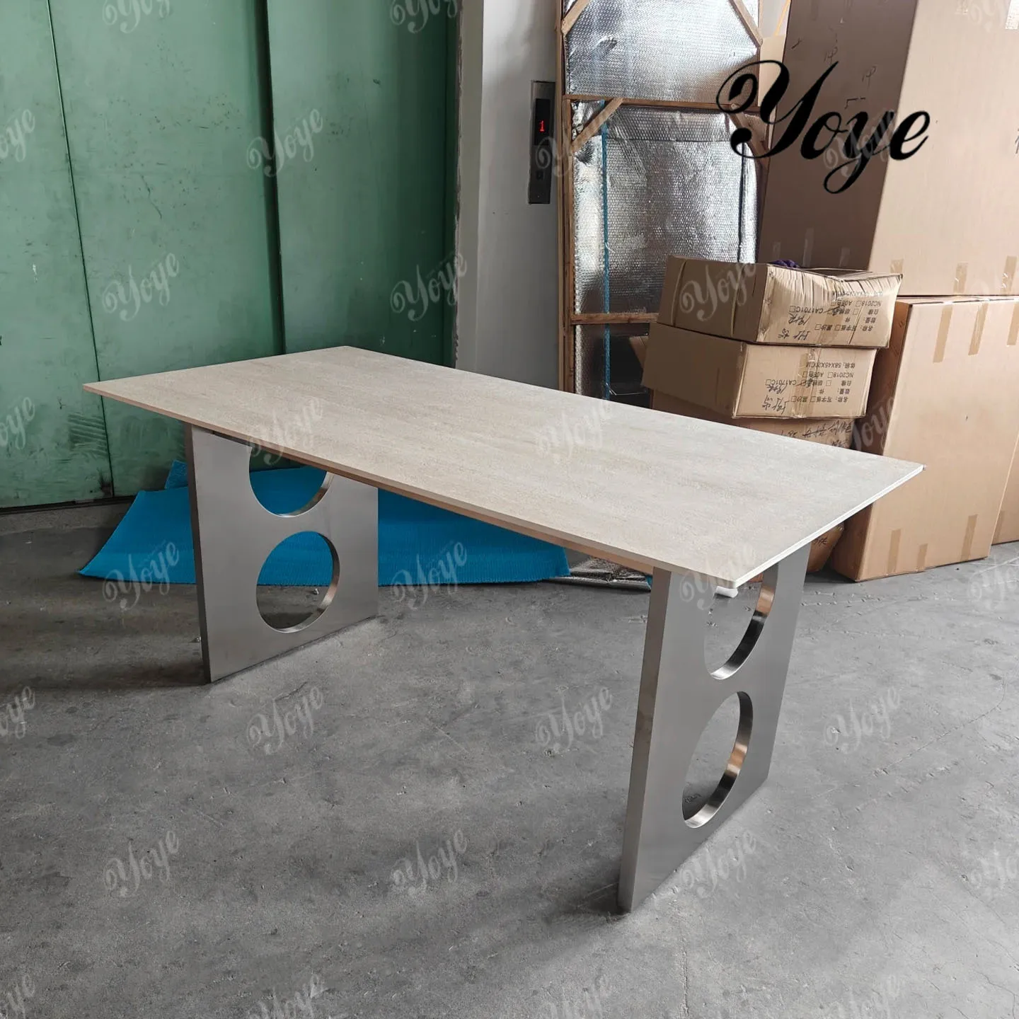 

Stainless steel Bauhaus style rock slab dining table rectangular travertine leg small apartment household dining table