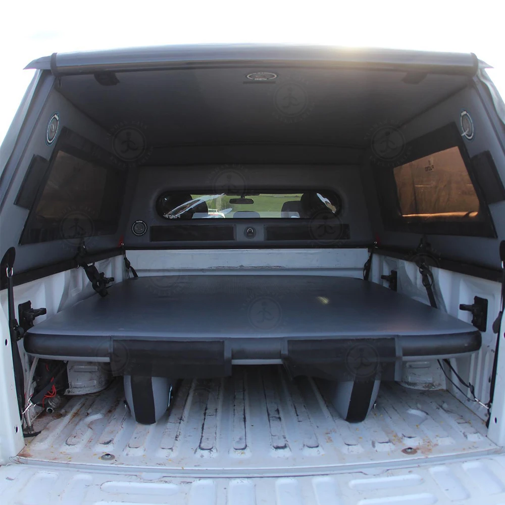 Foldable inflatable air bed raised platform truck bed sleeping platform