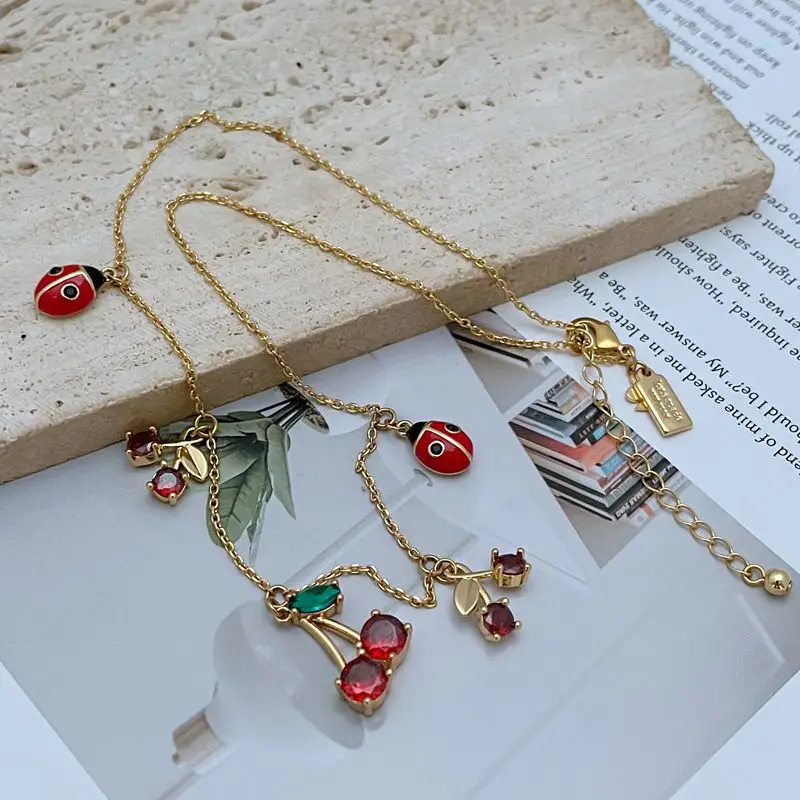 

New Arrival Style Fashionable Light Luxury Commuting Fresh Cute Ladybug Enamel Glazed Red Fruit Zircon Metal Necklace for Women