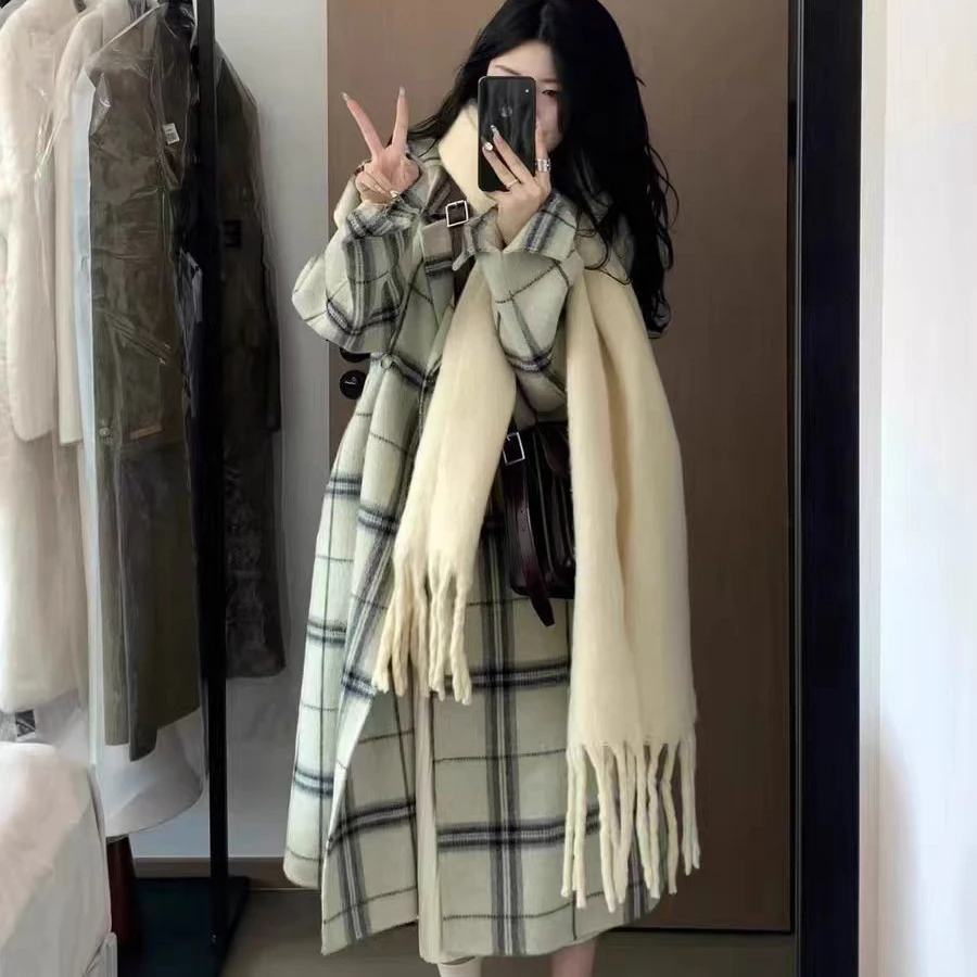 Giacca a vento in lana scozzese chic Cappotto da donna 2026 Autunno Inverno Nuovo trench lungo in lana allentato con cintura coreana