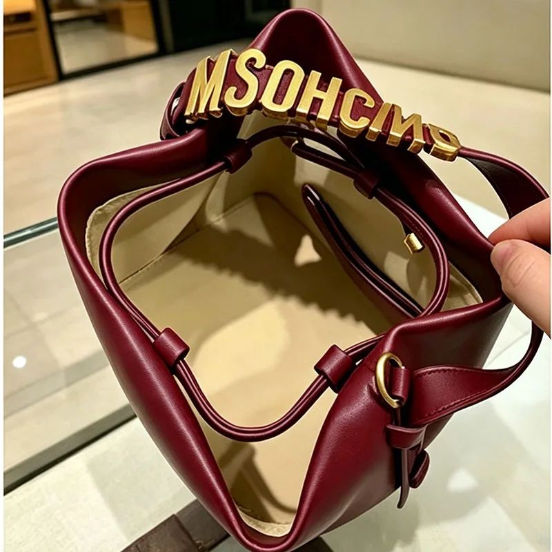 2026 New Light Luxury Drawstring Bucket Bag Trendy Gold Letter Handheld Crossbody Bucket Bag for Women Mini Shoulder Bag view 5