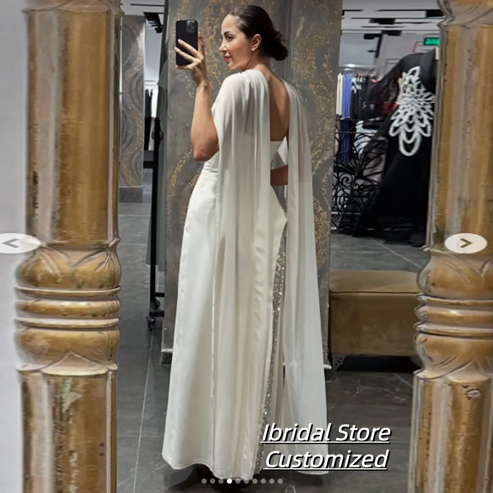 فستان سهرة مخصص على شكل حرف A بطول الأرض بدون حمالات بدون أكمام فستان حفلات بسيط على الموضة فستان حفلات ثنيات كريستالية