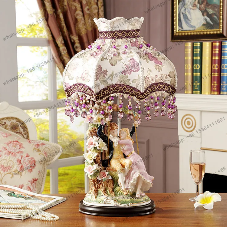 

High-end European ceramic table lamp couple swing wedding gift living room bedroom bedside ornament
