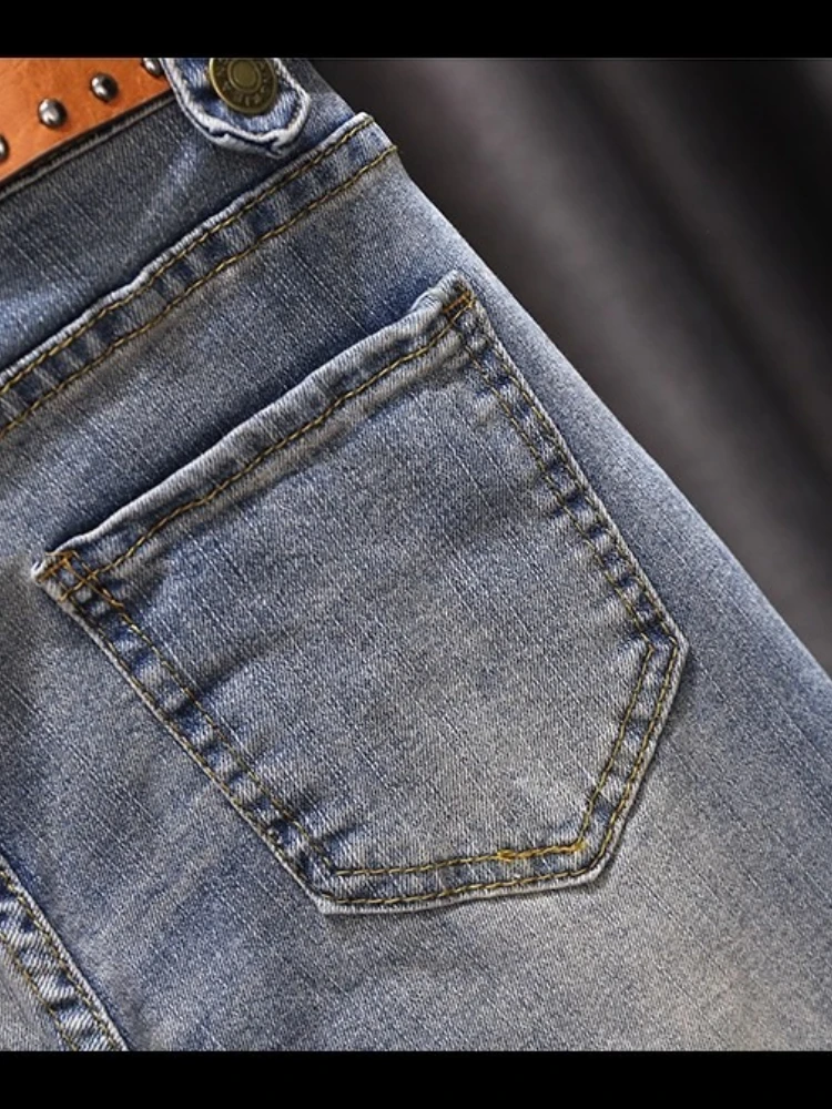 กางเกงยีนส์ไมโครทรงใหม่ปี 2025 สำหรับผู้หญิง ทรงสลิมเอวสูงแบบไม่สมมาตร กางเกงครอปทรงขาบาน สไตล์วินเทจแฟชั่นสำหรับฤดูใบไม้ผลิและฤดูใบไม้ร่วง