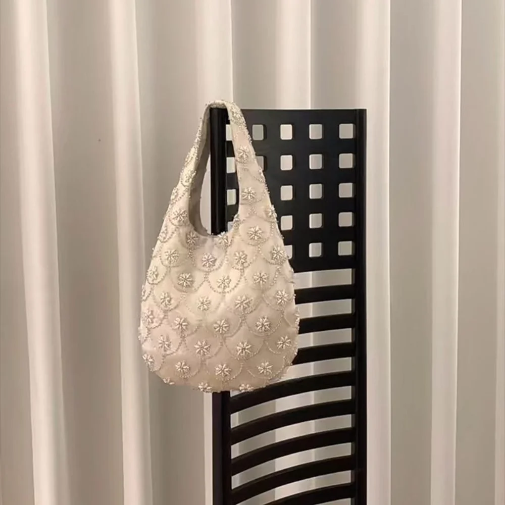 

2026 Spring New Chinese Style Gentle Elegant Shoulder Armpit Bag Temperament Rice Pearl Lace Handmade Handheld Bag For Women