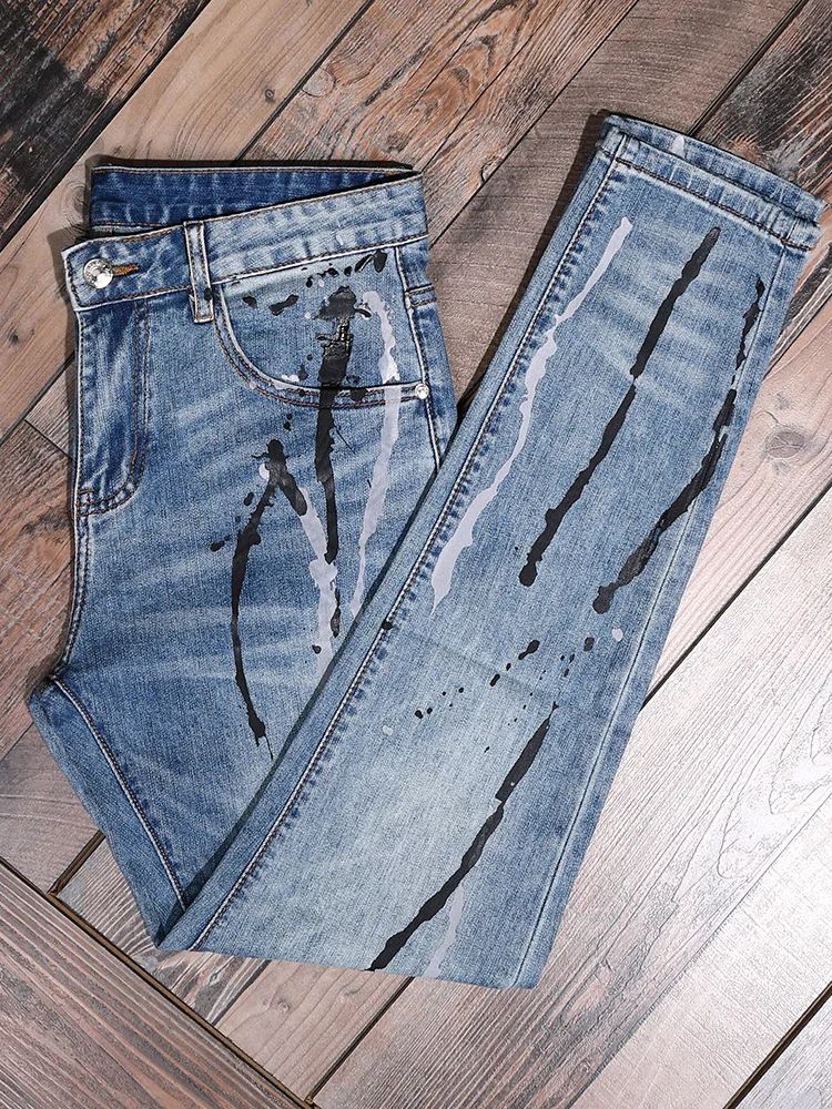 2025New Year's Ink Splash Print Jeans Men Street Graffiti Design Casual Retro Stretch Pants