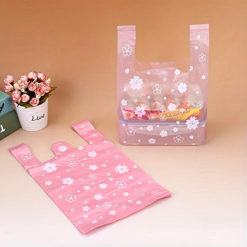 100pcs Hand-Carrying Shopping Packaging Bag Jewelry Gift Vest Bag Cute Pink Sakura Plastic Packaging Bag Home Kitchen Gadgets