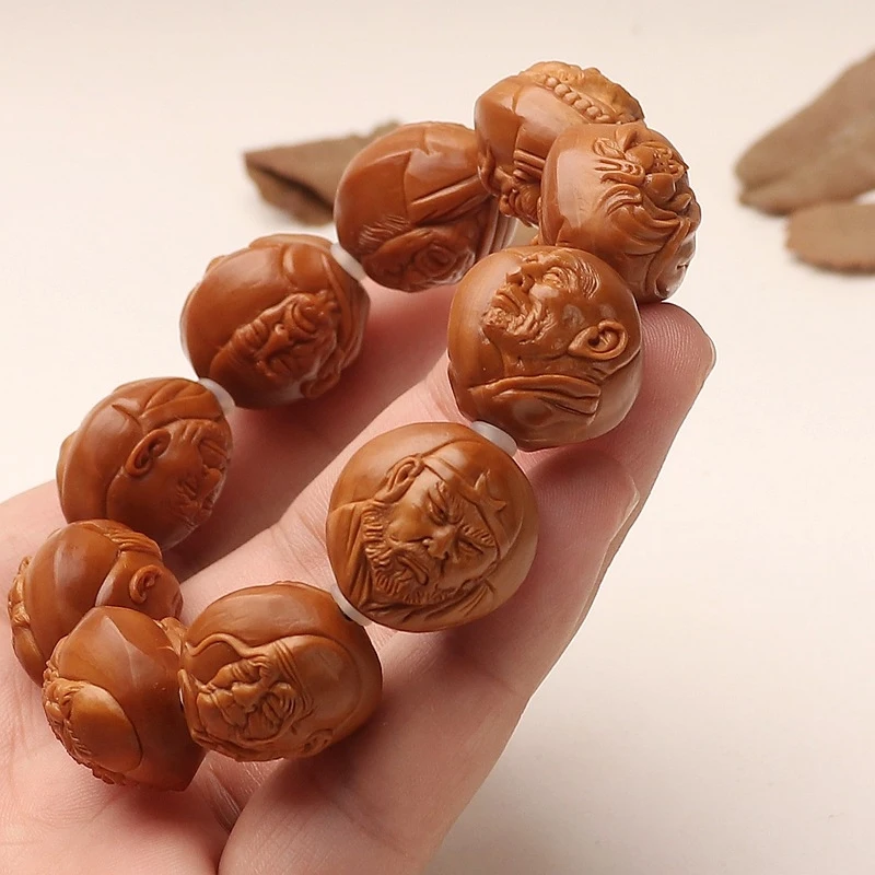 Realistic relief double-sided hand-carved Eighteen Arhats olive pit bracelet, a hand-carved cultural item for personal enjoyment