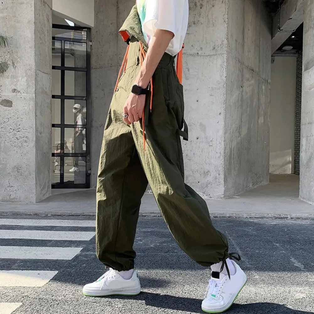 Men Jumpsuit Vintage Loose Suspenders Pocket Solid Color Dress-up Drawstring Sleeveless Hip Hop Men Pants Male Casual Overalls