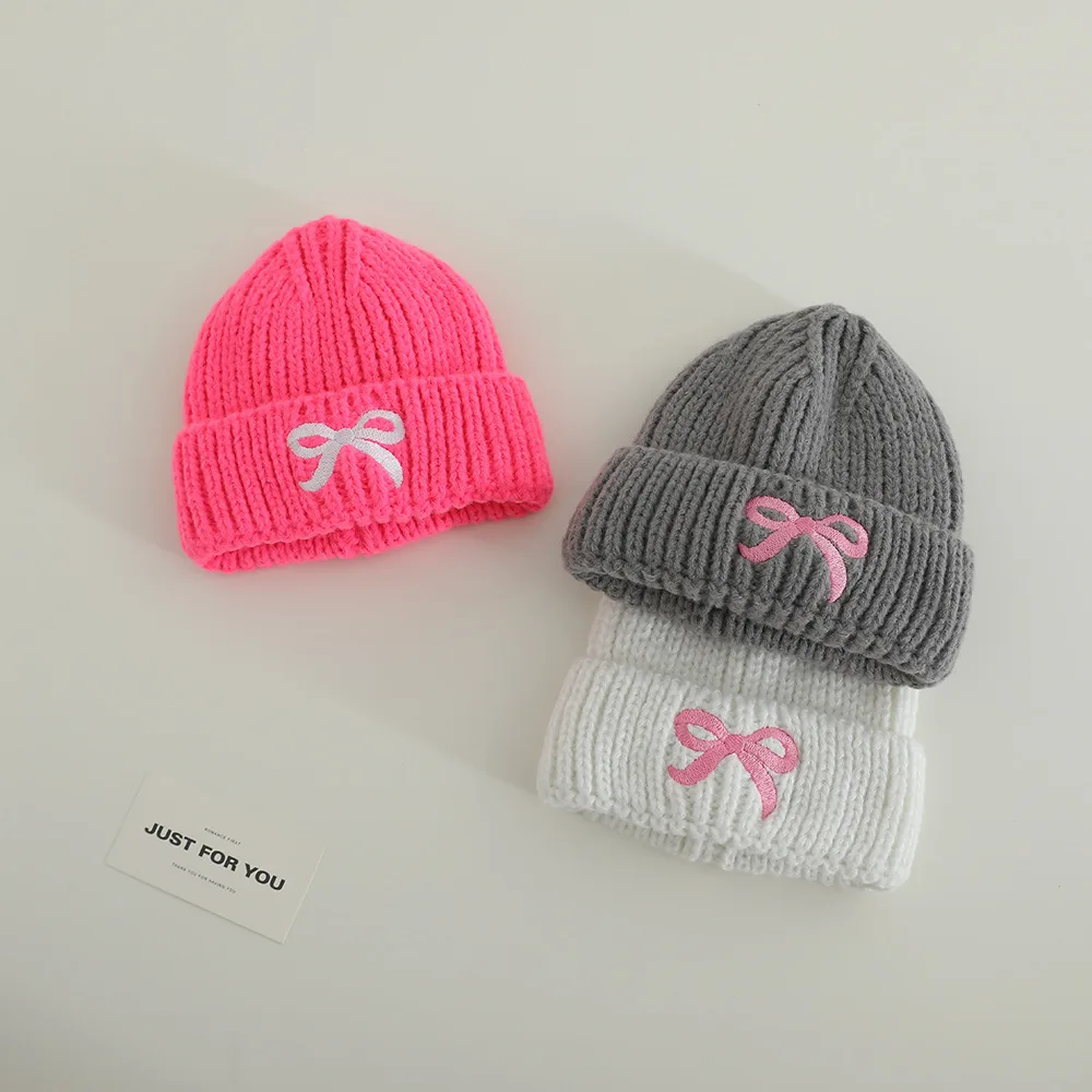 الأطفال محبوك قبعة لينة دافئة 48-52 سنتيمتر الخريف الشتاء الفتيات الفتيان يندبروف القبعات مع القوس طفل الباردة برهان قبعة الاطفال رشاقته قبعات