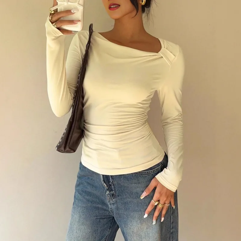 Cor sólida de manga comprida estilo casual feminino em torno do pescoço outono novo ajuste fino plissado irregular versátil topo