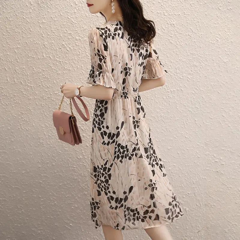 Elegant V-Neck Printed Folds Ruffles Flare Sleeve Party Dress Women\'s Clothing 2024 Summer New Loose Office Lady Floral Dress