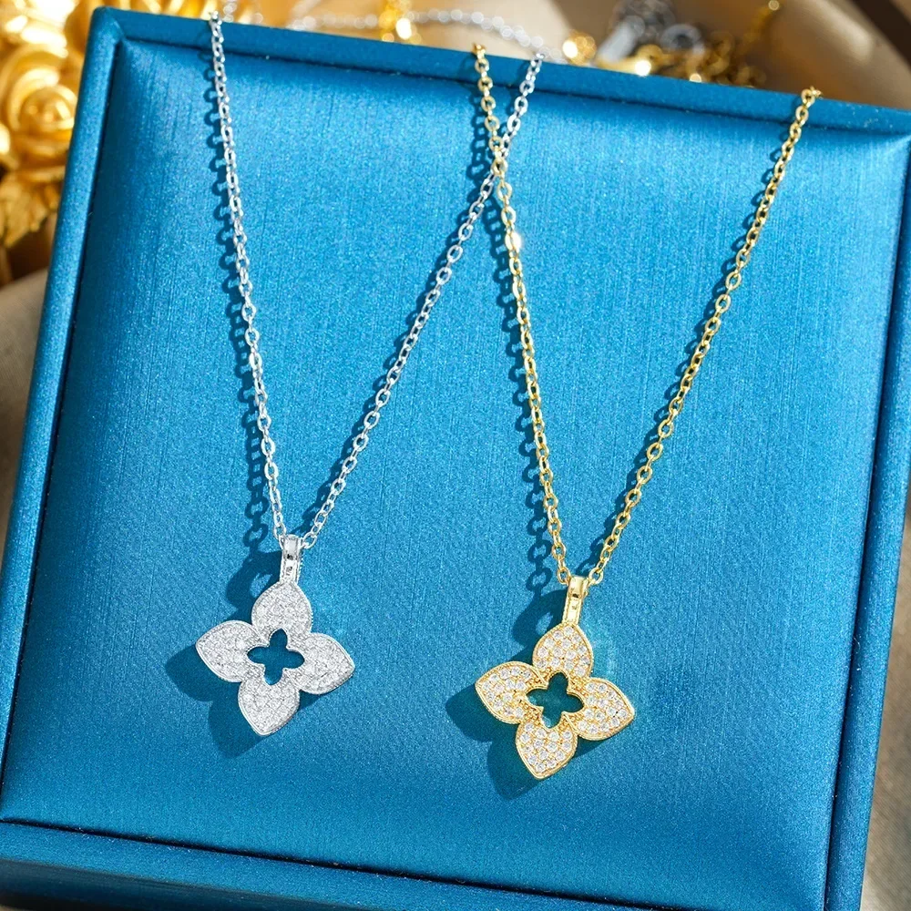 A new light luxury women's necklace with a silver perforated four-leaf flower made of titanium steel in 2025