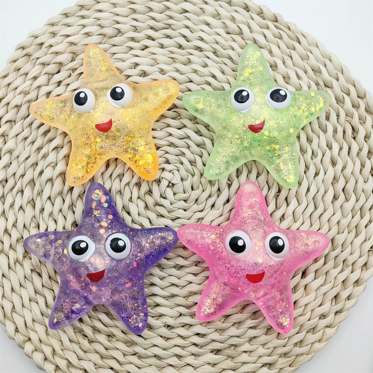 Antiestrés suave TPR rebote lento lentejuelas maltosa pellizco juguete alivio del estrés elástico exprimidor ojos de colores estrella de mar descompresión