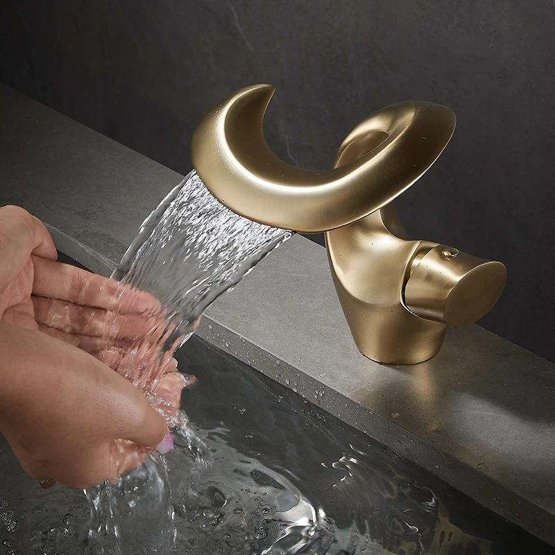 

Bathroom basin faucet hot and cold brass bathroom creative washbasin waterfall style single hole countertop basin for home use