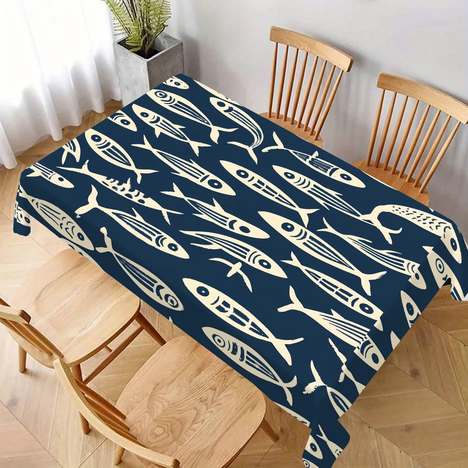 One simple fish-shaped tablecloth, creating an atmosphere of marine art. Rectangular, durable polyester fabric.zyc