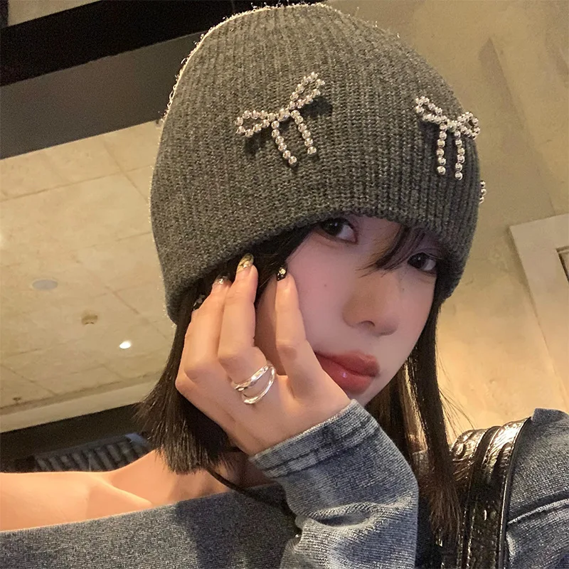 Autumn And Winter Korean Style Women's Bow Woolen Hat Knitted Face-showing Small Ins Warm And Versatile Ear Protection Cap