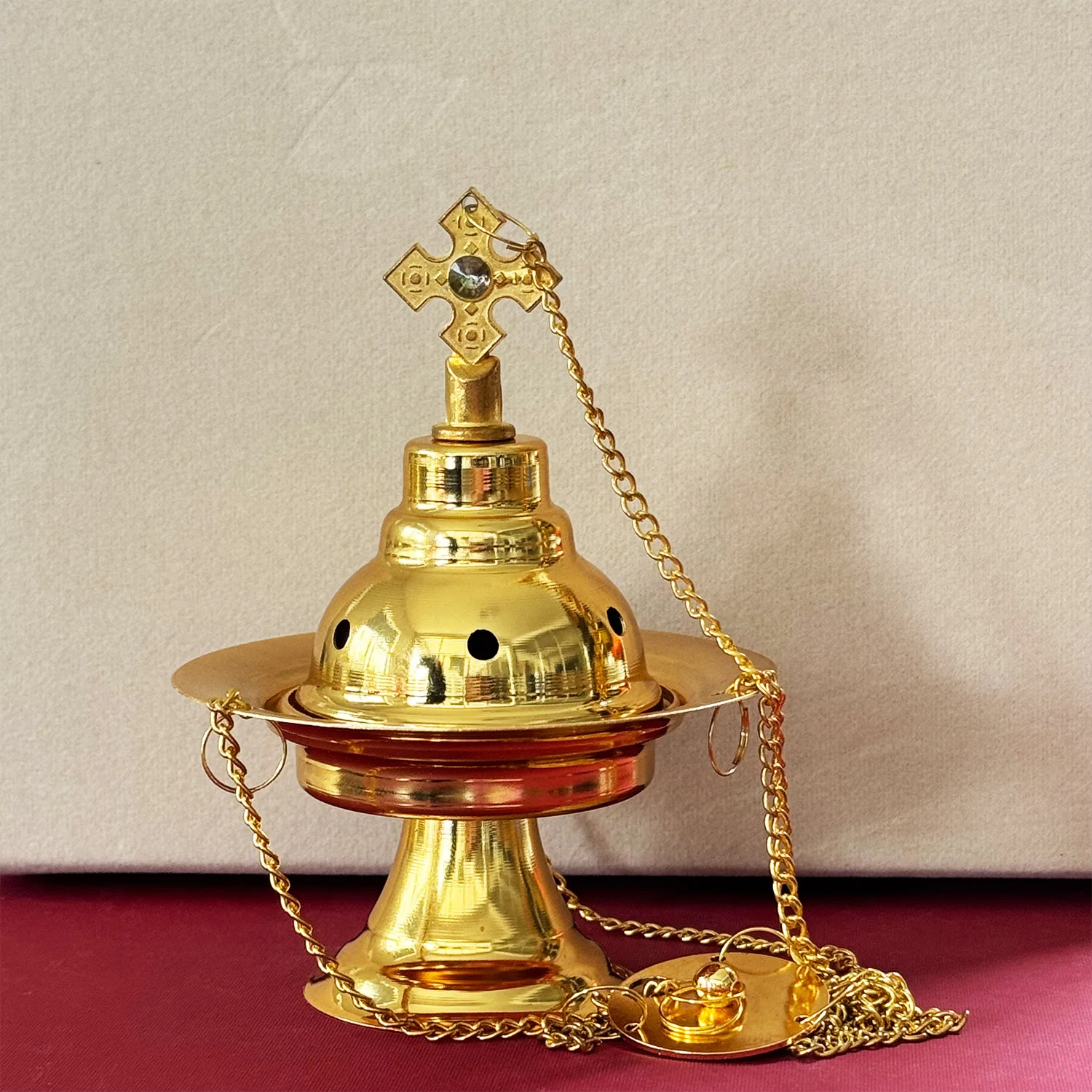 Hanging Incense Burner: Features a gold-plated finish for enhanced durability. Compact incense burner.