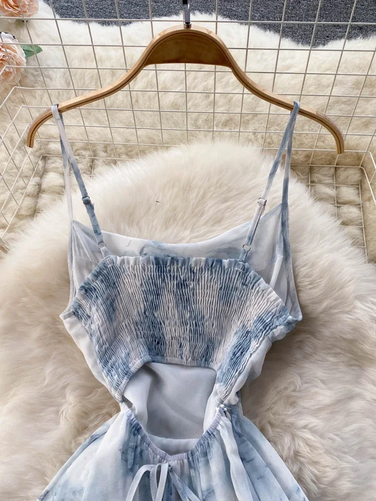 Abito lungo moda estiva donna stampa floreale Sexy Hollow Backless Strappy Party Dress femminile Boho Vacation Beach Outing prendisole